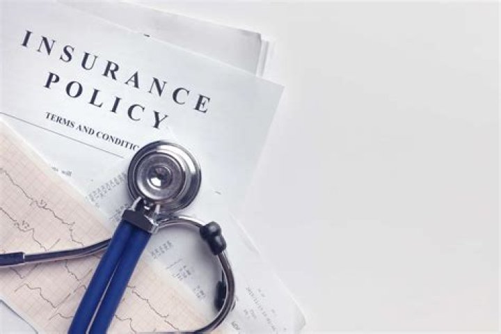 Are domestic partners covered under health insurance in Wisconsin?