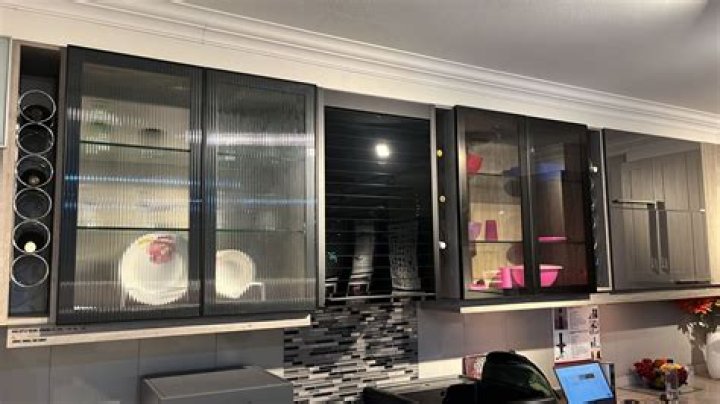Are glass cabinet doors more expensive?
