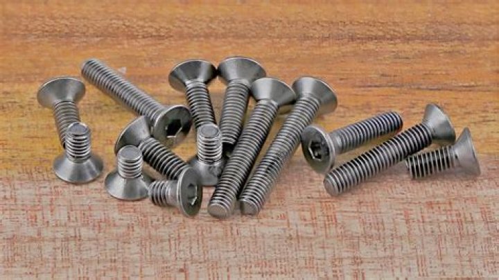 Do adjustable triggers have screws for adjustments?