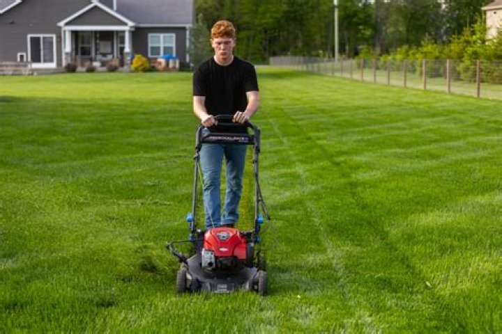 Do you have to stay off lawn after overseeding?
