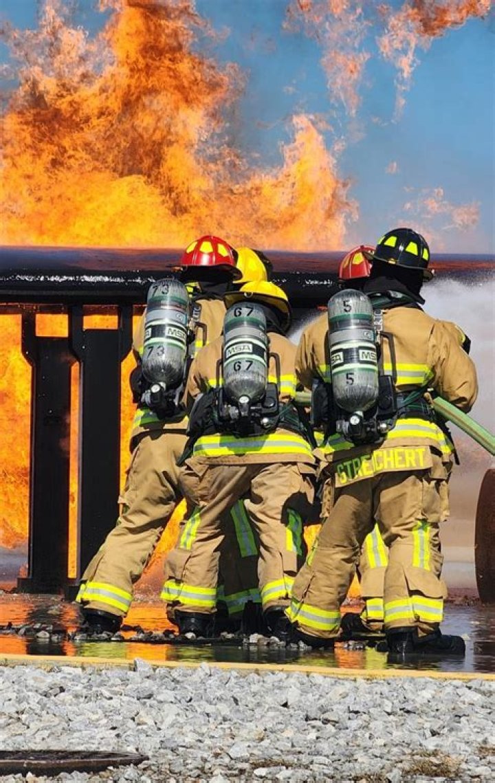 How do firefighters know when there is a fire?