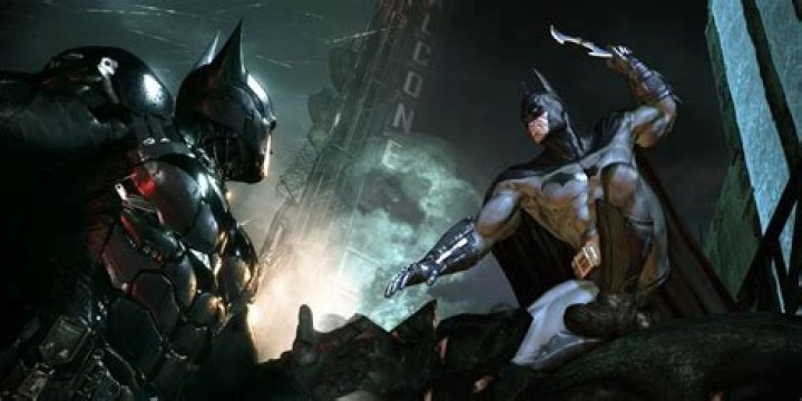 How do I access the DLC in Batman: Arkham Origins?