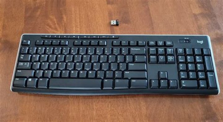 How do I connect my Logitech keyboard to my computer?