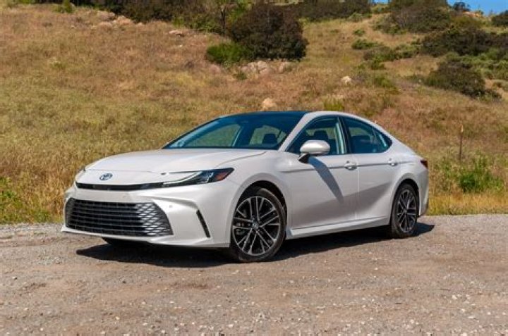 How do I get the best gas mileage on my Toyota Camry Hybrid?