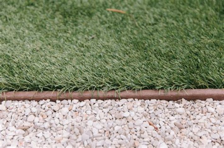 How do I keep grass from smelling under my pool?