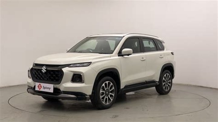 How do I put my Suzuki Grand Vitara in 4 wheel drive?