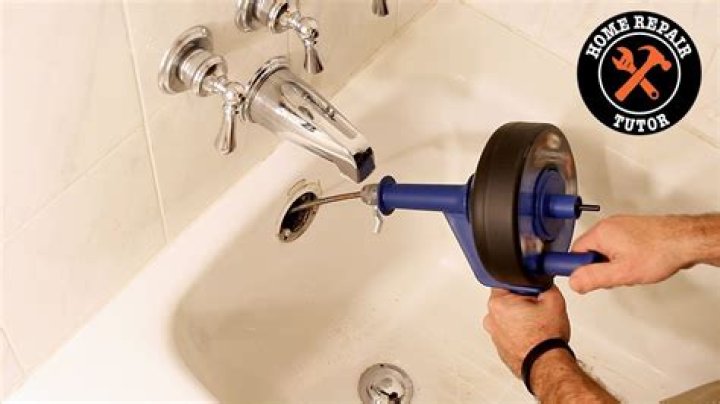 How do I remove a bathtub drain pipe?
