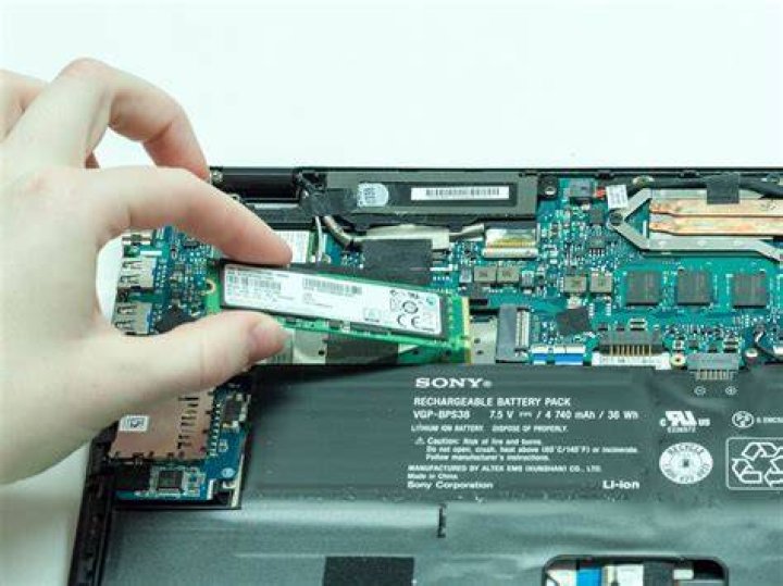 How do I remove the hard drive from a Sony VAIO PCG?