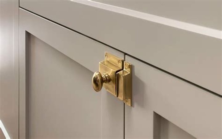How do you embellish a cabinet door?