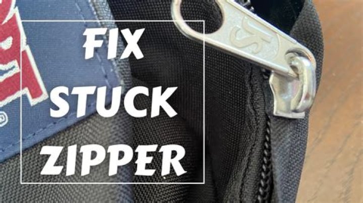 How do you fix a stuck CD tray?