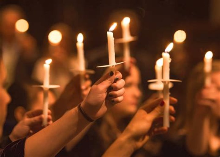 How do you hold a candle in place?