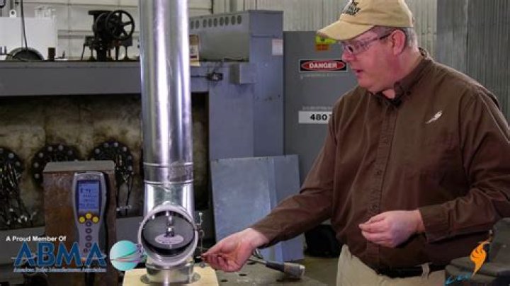 How do you install a barometric damper?