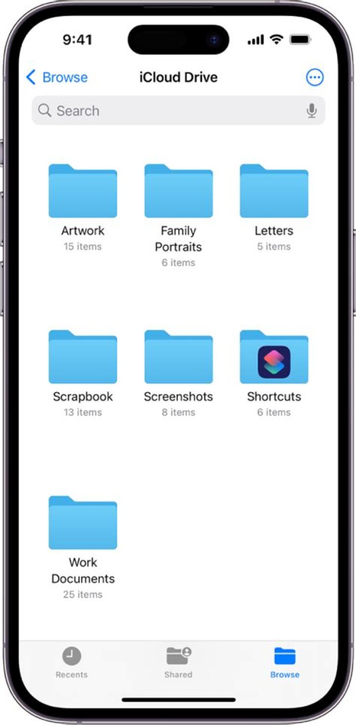 How do you put a folder in a folder iOS 14?