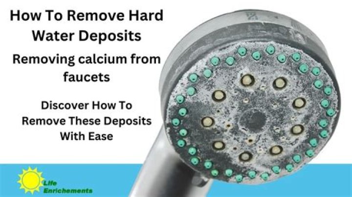 How do you remove calcium deposits from a shower floor?
