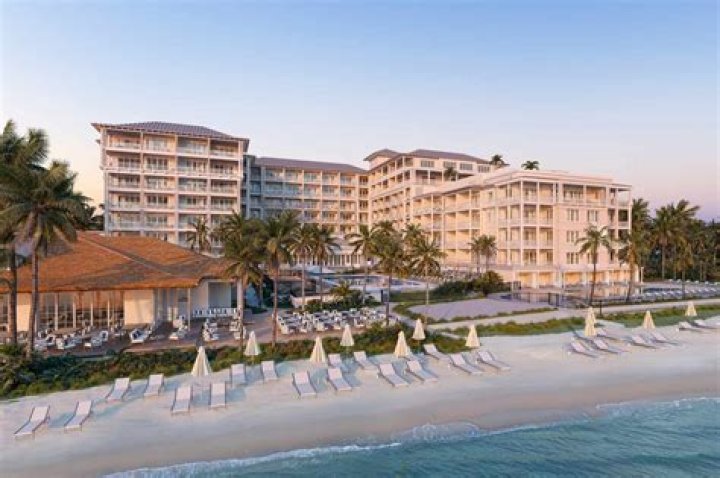 How far is Naples Bay Resort from the beach?