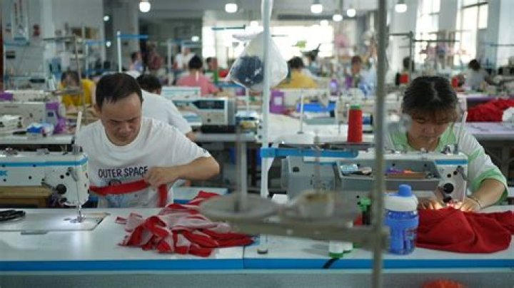 How many hours do sweatshop workers work a day?