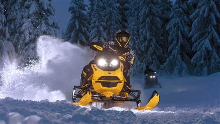 How much does it cost to rent a snowmobile in NH?