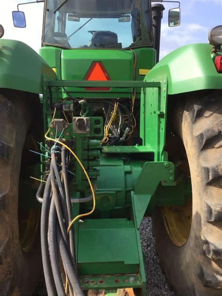 How much horsepower does a 9520 John Deere tractor have?