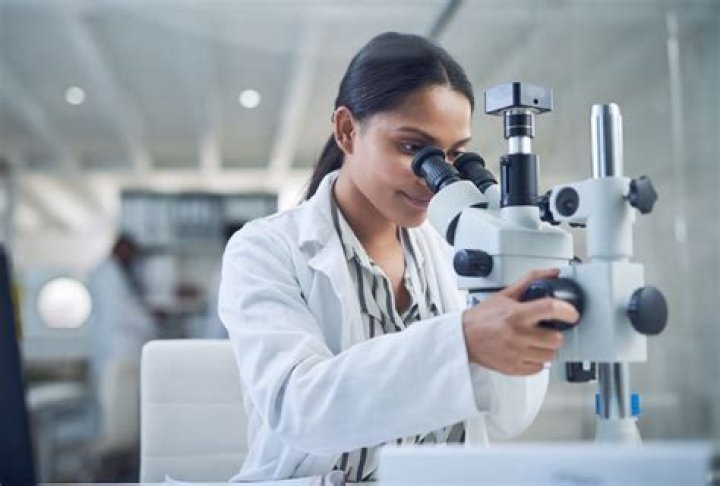 Is a pathologist a doctor or a scientist?