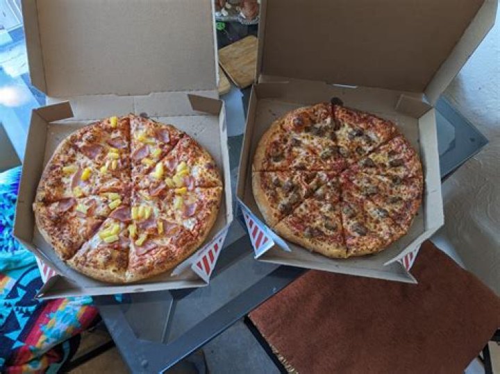 Is Dominos hand tossed or pan pizza better?