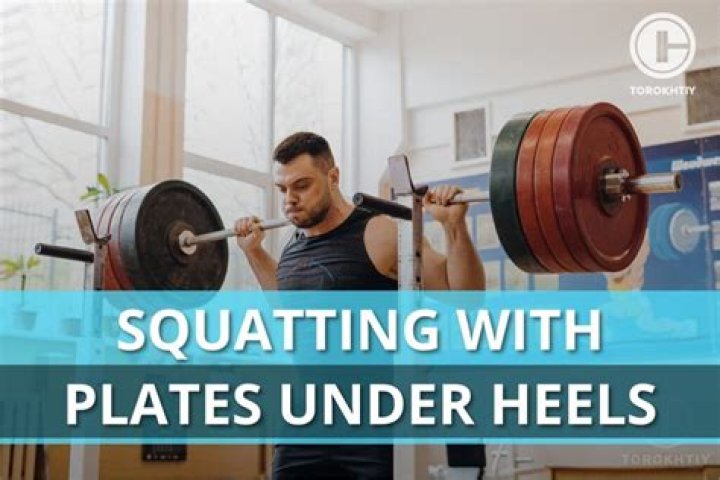 Is it good to put plates under your heels when squatting?
