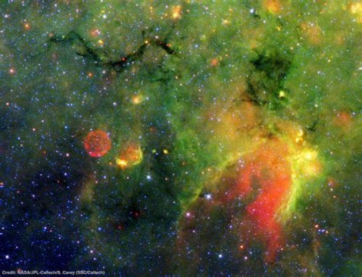 What are interstellar clouds mainly composed of?