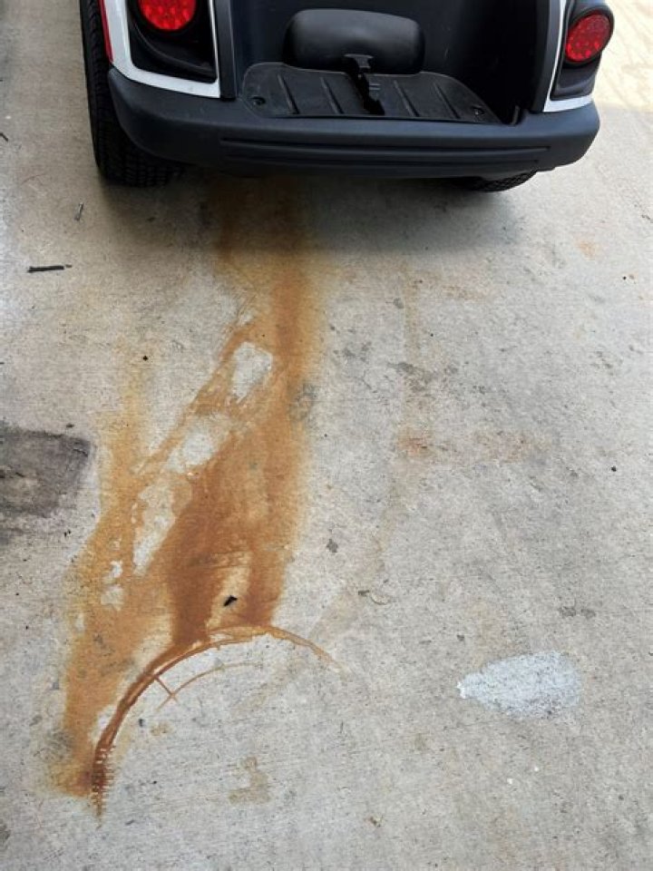 What causes rust spots on stucco?