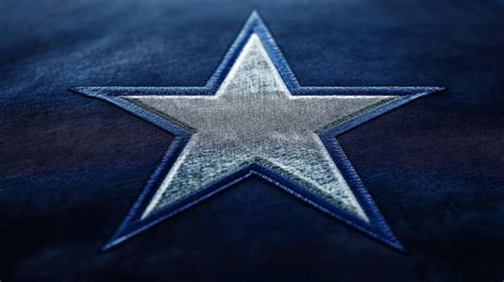 What color jersey is home for Dallas Cowboys?