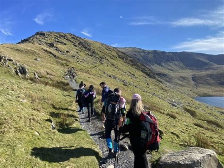 What do most tourists do when in Snowdonia?