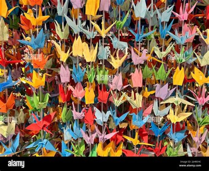 What do paper cranes symbolize?