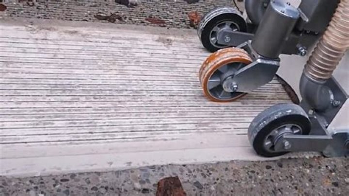 What does a concrete scarifier do?