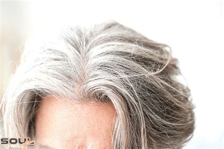 What does a single strand of white hair mean?