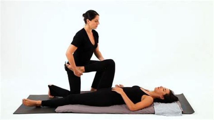 What does shiatsu massage do?