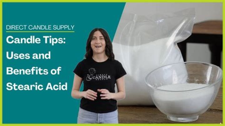 What does stearic acid do in candles?