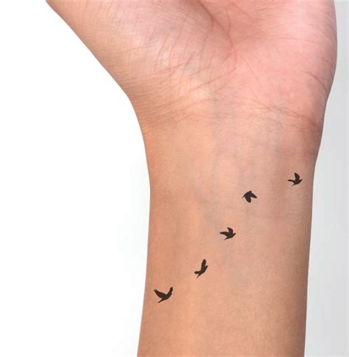 What does the flying bird tattoo mean?