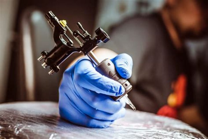 What equipment do tattoo artists use?