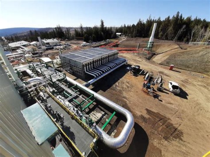 What happens to natural gas at a compressor station?
