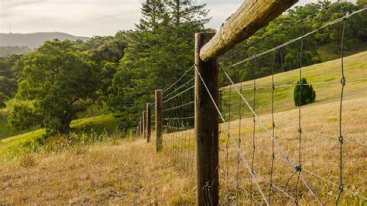 What is a fencing strainer?