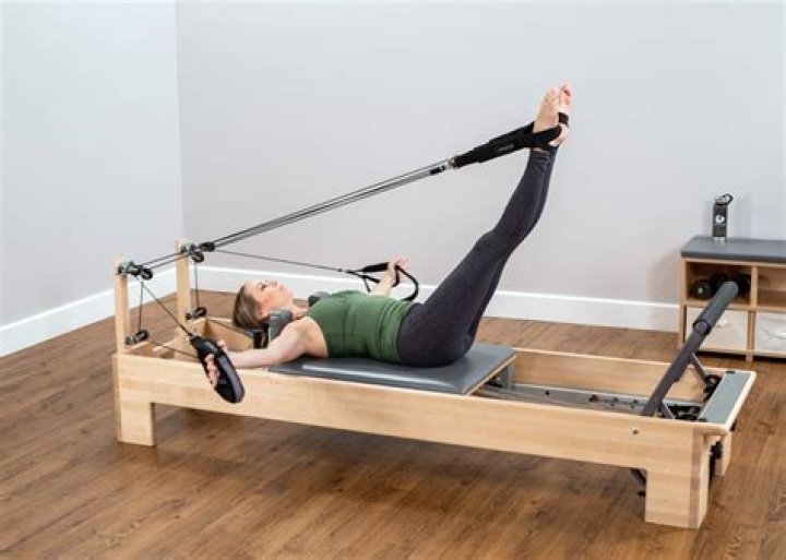 What is a reformer in Pilates?