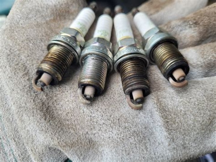 What is a spark plug gauge used for?