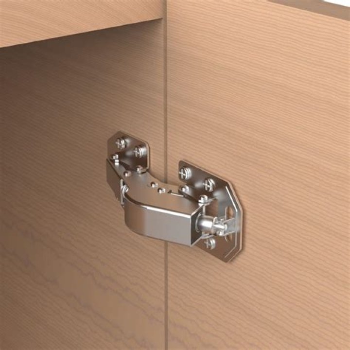What is a surface mount cabinet hinge?