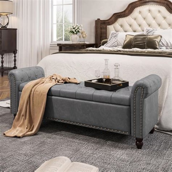 What is the bench at end of bed called?