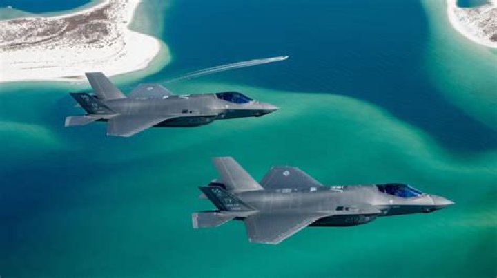 What is the difference between a fighter and an attack aircraft?