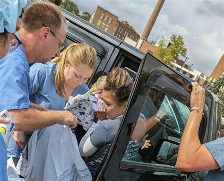 What is the doctor called that helps deliver babies?