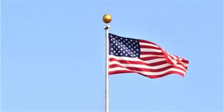 What is the purpose of the ball on top of a flagpole?