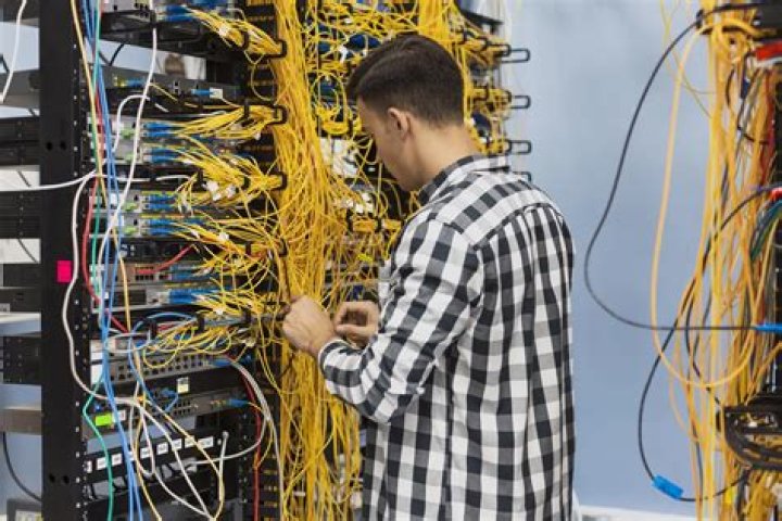 What is the role of a telecommunications technician?