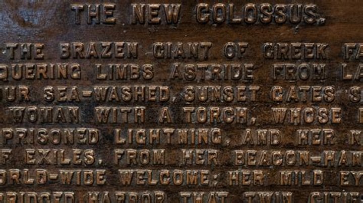 What is written on the Statue of Liberty tablet?