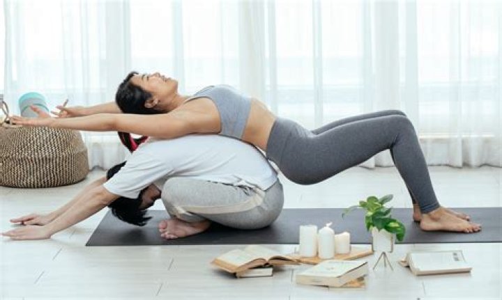 What is yoga with 2 people called?