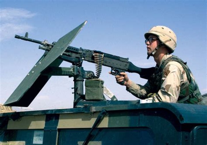 What replaced the squad automatic weapon?