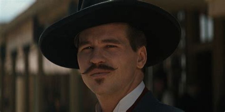 What type of hat does Doc Holliday wear in Tombstone?